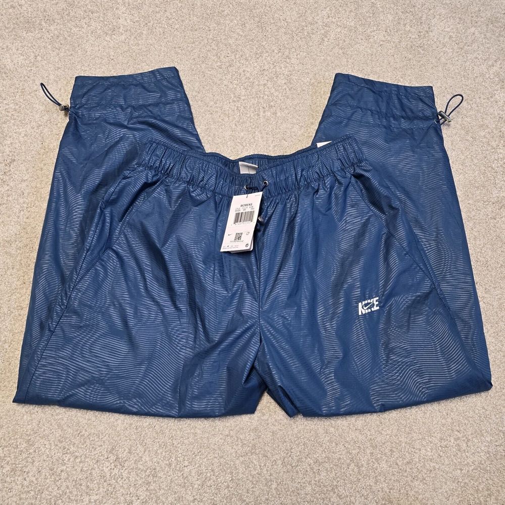 Nike Womens Blue High Rise Loose Fit Cropped Track Pants Sz M NWT Gorpcore Gym